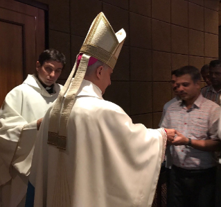 Archbishop Rino Fisichella celebrates Mass for Ventura crew